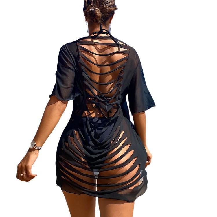 European & American Plus Size Slimming Beachwear: Women's Sexy Hollowed-out Sun Protection Cover-up.