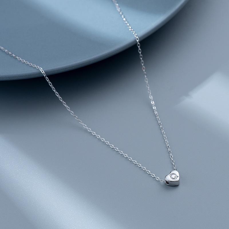 S925 Silver Heart-Shaped Initial Necklace - Korean Style Clavicle Chain with Trendy Peach Heart Design.