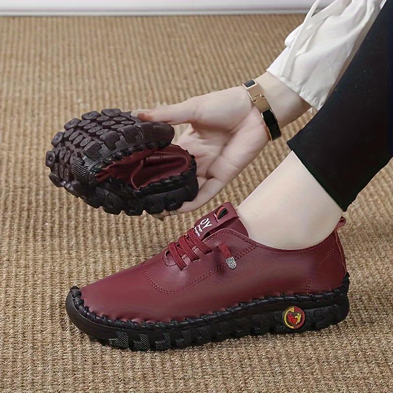 Komfortable, flate sneakers med snøring for kvinner for fritidsbruk