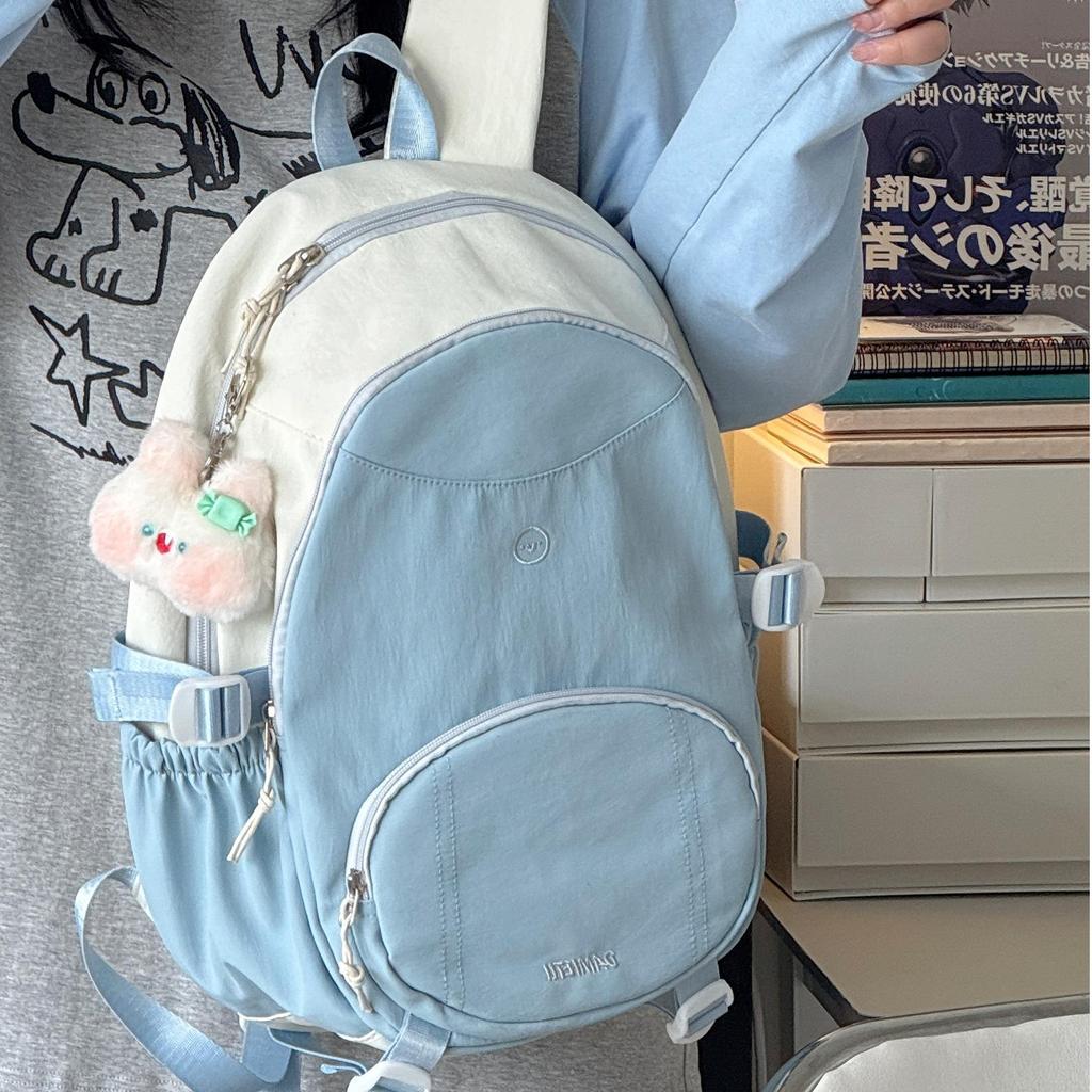High-value color matching schoolbag for female junior high school casual and versatile, simple backpack, large-capacity student computer backpack tide