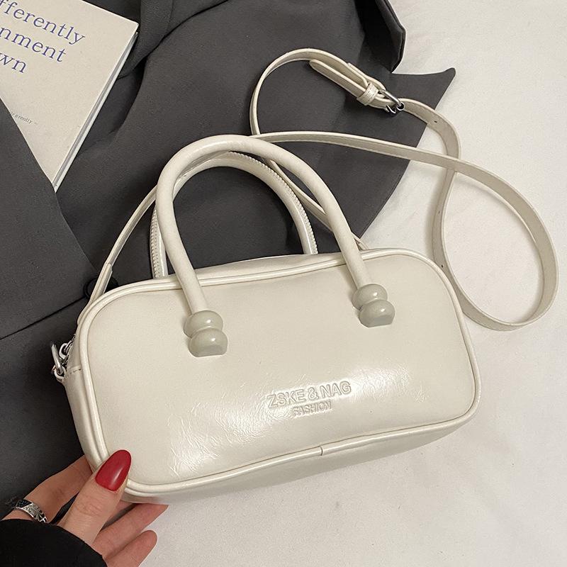 Korean Version of Fashionable Simple Retro Solid Color Portable Boston Bag Casual Versatile Solid Color Commuting Foreign Style Messenger Women's Bag