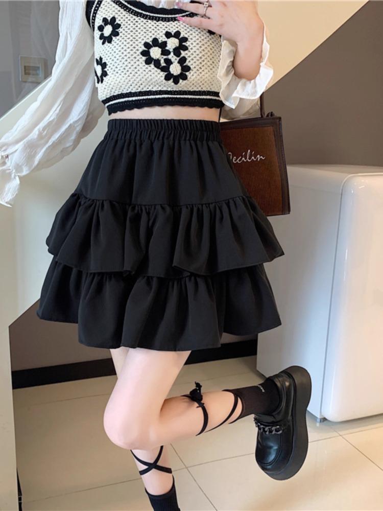 Modischer schwarzer Midi-Rock 2025: Rüschen-Schlankheitsdesign, Hohe Taille, Große Größen, Frühjahrs- und Herbst-Puff-Stil für Damen