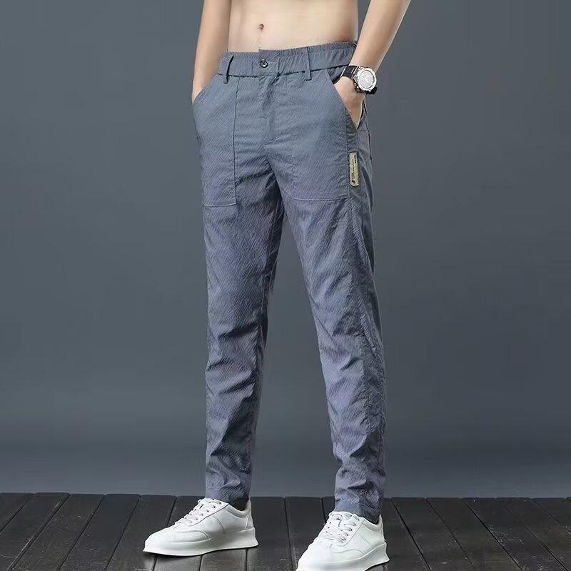 

Мужские ультратонкие быстросохнущие летние повседневные брюки в корейском стиле 32