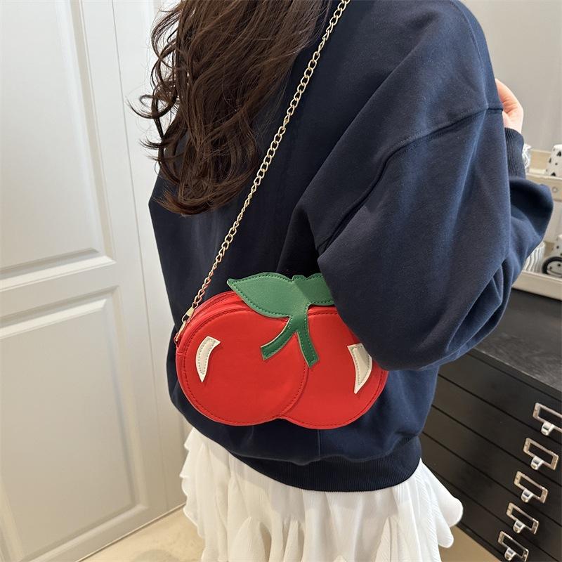 

Summer new creative cherry shape cute personality solid color large capacity chain portable shoulder messenger bag красный