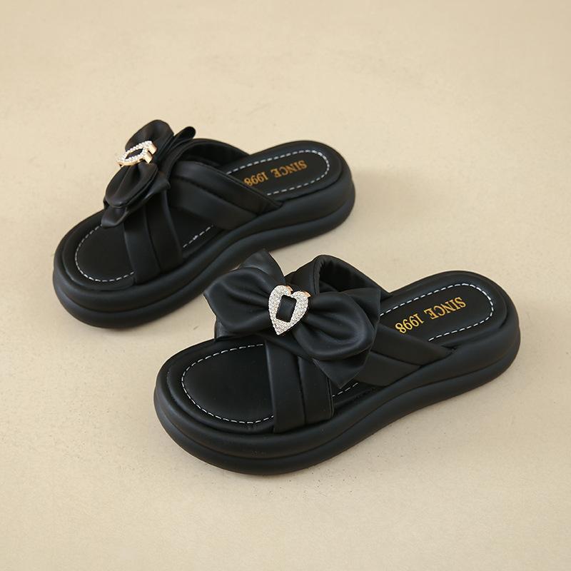 Stepping on shit slippers fairy style women's models 2025 summer new models wear thick-bottomed bows with skirts cool slippers