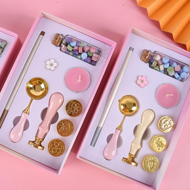 Retro Nine-Piece Wax Seal Stamp Set with Stamps, Wax Granules, Handle, Spoon, and Envelopes
