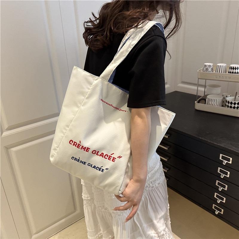 Summer New Lightweight and Beautiful Casual Handbag Versatile Commuter Student Class Dual-purpose Shoulder Armpit Bag