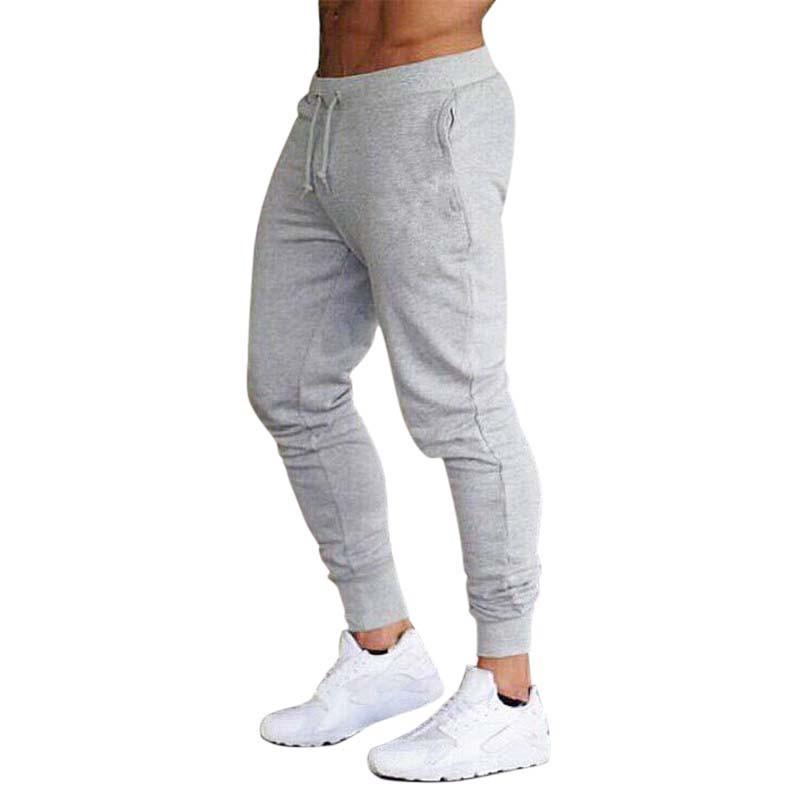 European & American Sports Pants: Men's Fitness Jogging Trousers for Spring/Autumn - Solid Color Fashion Casual Wear