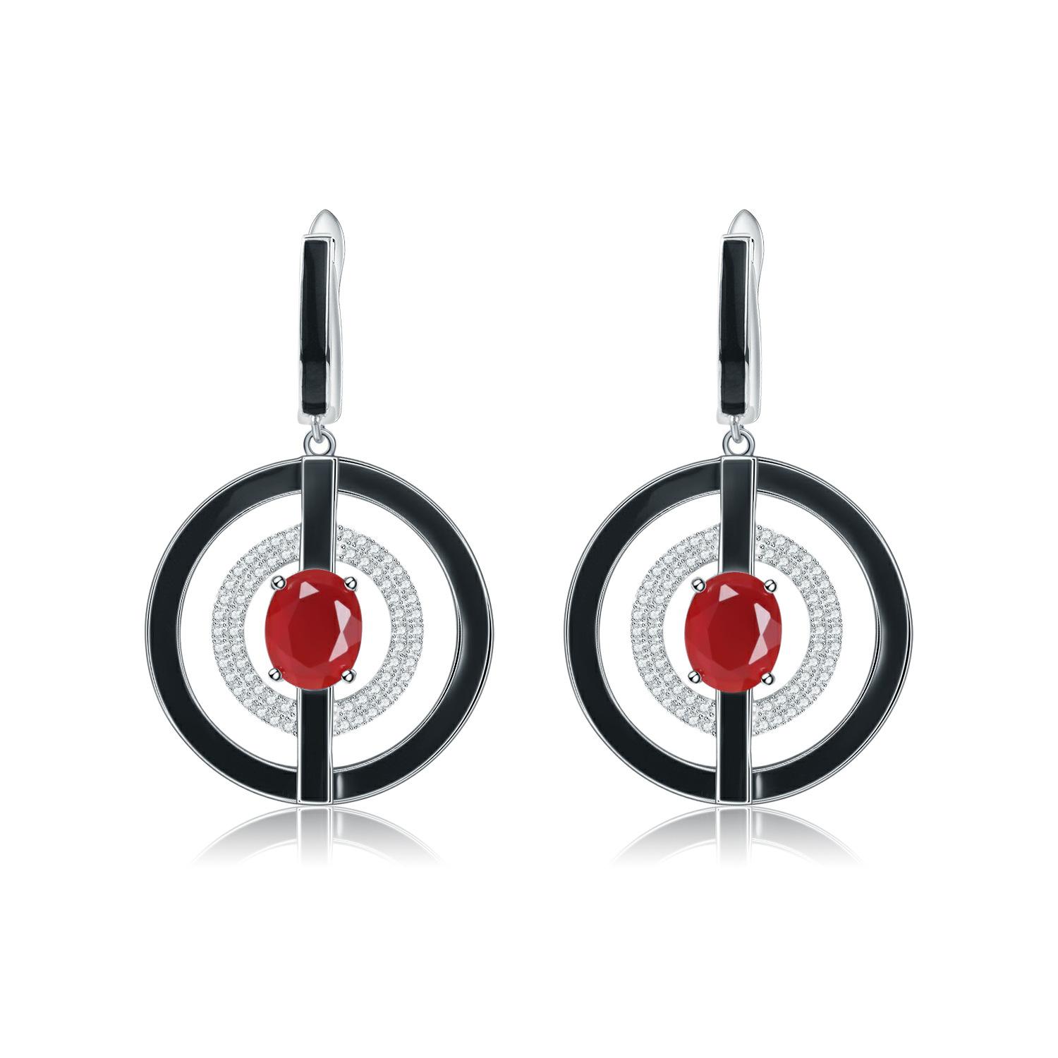 

Оригинальные авторские серьги с эмалью из натурального топаза. Серьги с драгоценными камнями из серебра 925 пробы с индивидуальным дизайном.