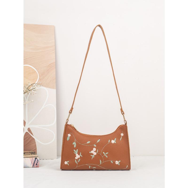 

Embroidered ladies fashion armpit bag niche elegant ladies bags trendy commuter armpit bag shoulder bag коричневий