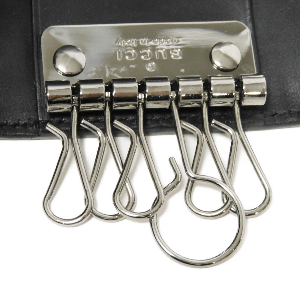 Used Guccissima 6-ring keychain (138093 7949) with double G embossing (9539) in black. Unisex. from Japan AUTHENTIC