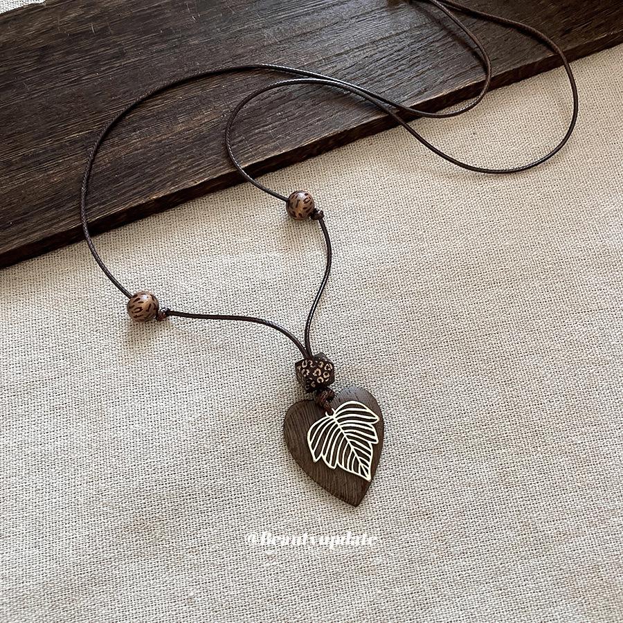 Retro Ethnic Leather Rope Necklace with Wooden Heart, Leaf, and Geometric Water Drop - High-Grade Sweater Chain