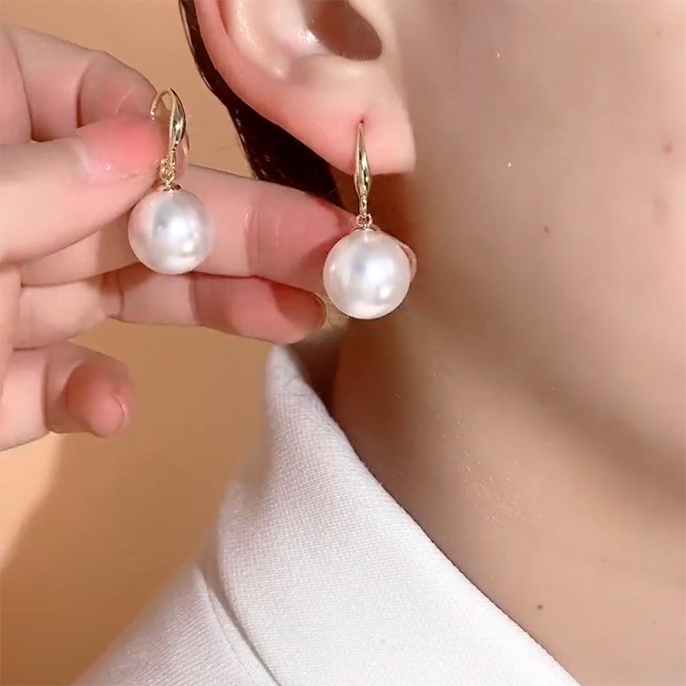 2024 French Minimalist Red Pearl Earrings: Elegant Retro High-End Ear Hooks for a Festive New Year
