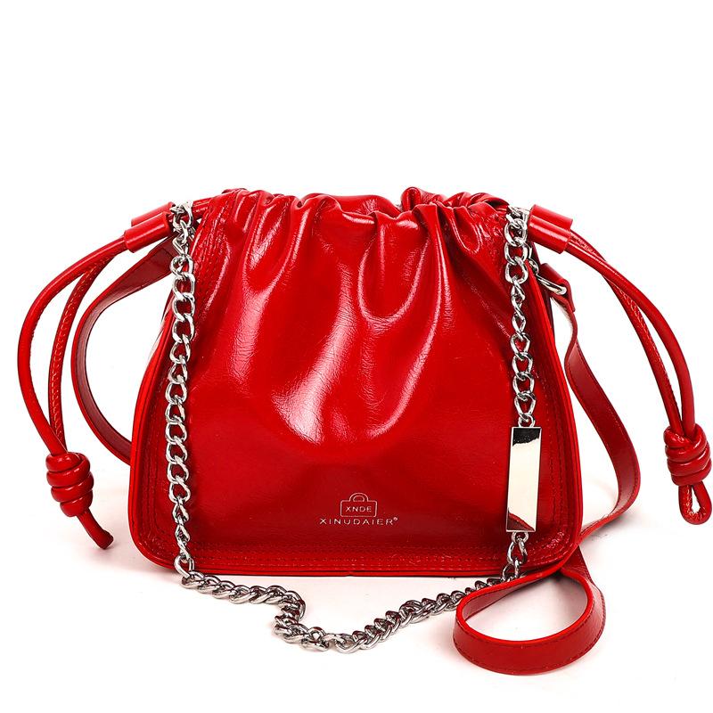 Solid color pump belt bucket bag women's winter new popular personality chain fashionable simple shoulder messenger bag