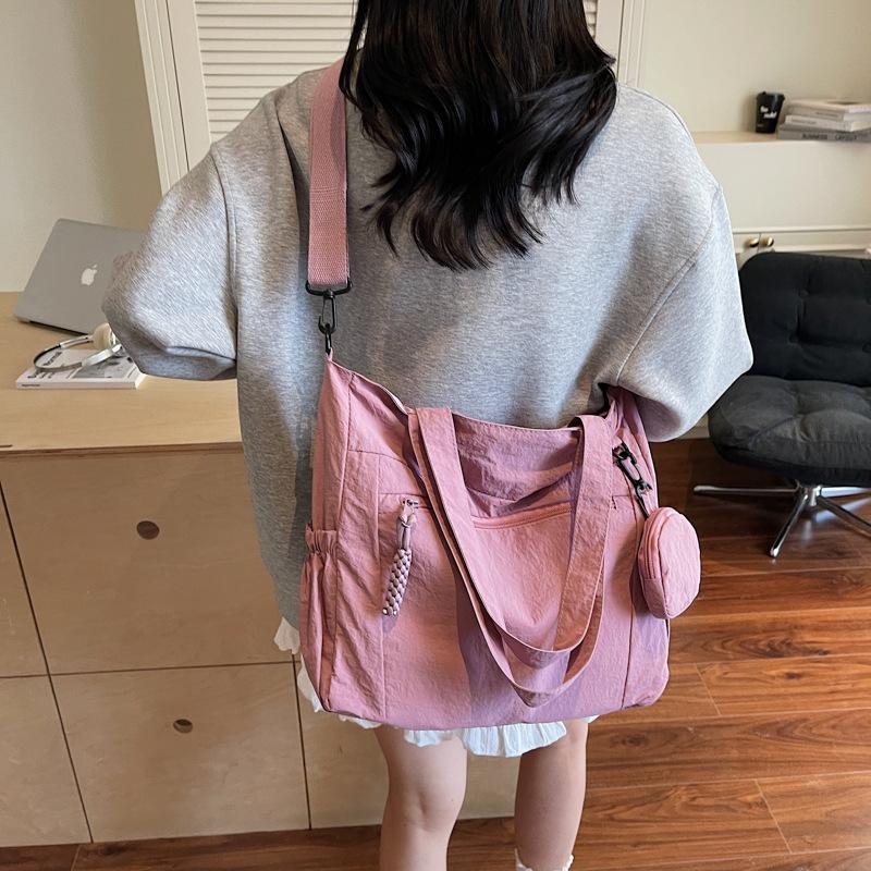 Large capacity go out canvas bag, light casual messenger bag, women's multi-functional trend, solid color simple student shoulder bag