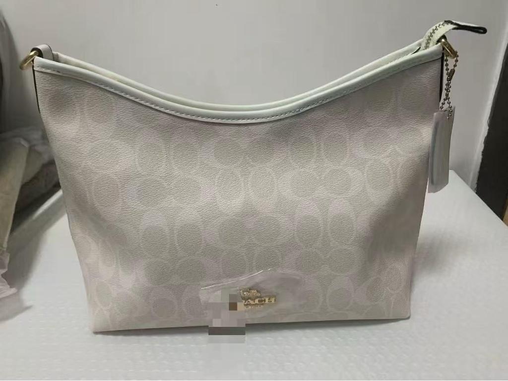 Coach Laurel Hobo Bag: Versatile, Large-Capacity Shoulder, Crossbody, and Handbag for Women.