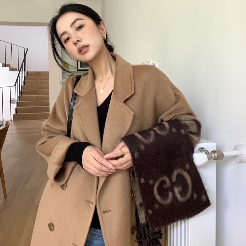 

Двубортное пальто из шерсти альпаки крупной вязки с поясом Large