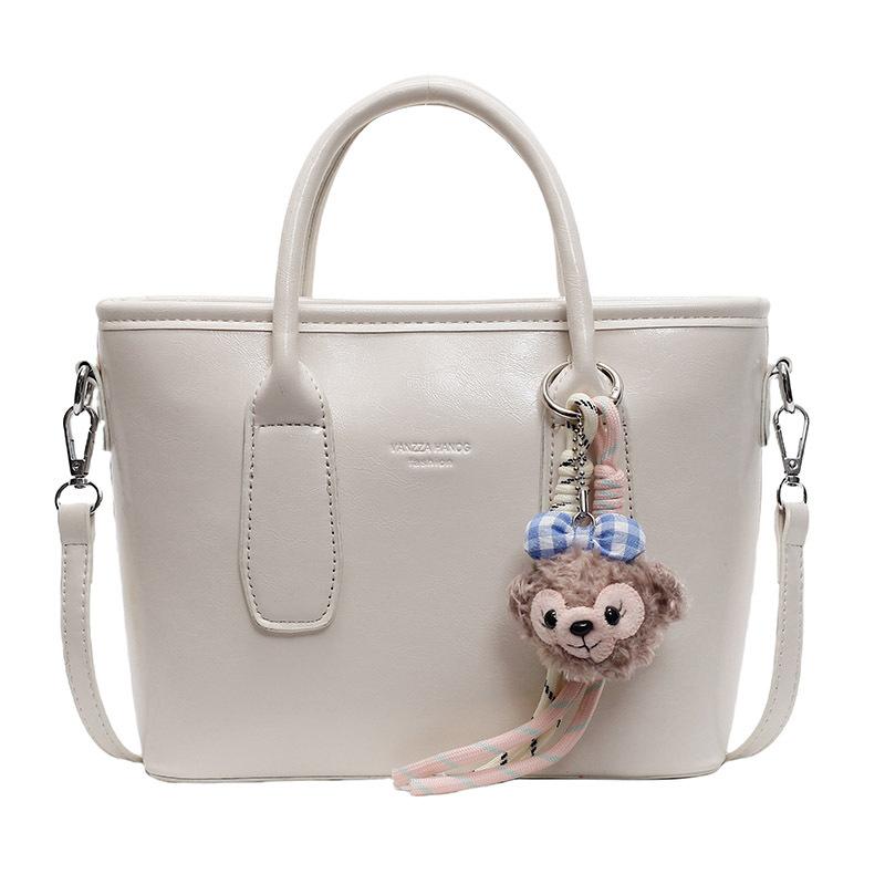 New High-end Korean Version Hugh Simple Portable Bucket Bag Versatile Commuter Fashion Niche Messenger Bag Bag Woman