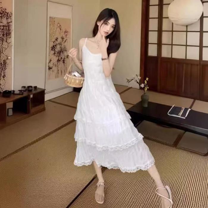 French super fairy V-neck mid-length slip cake dress women's new Korean version of the seaside resort beach dress