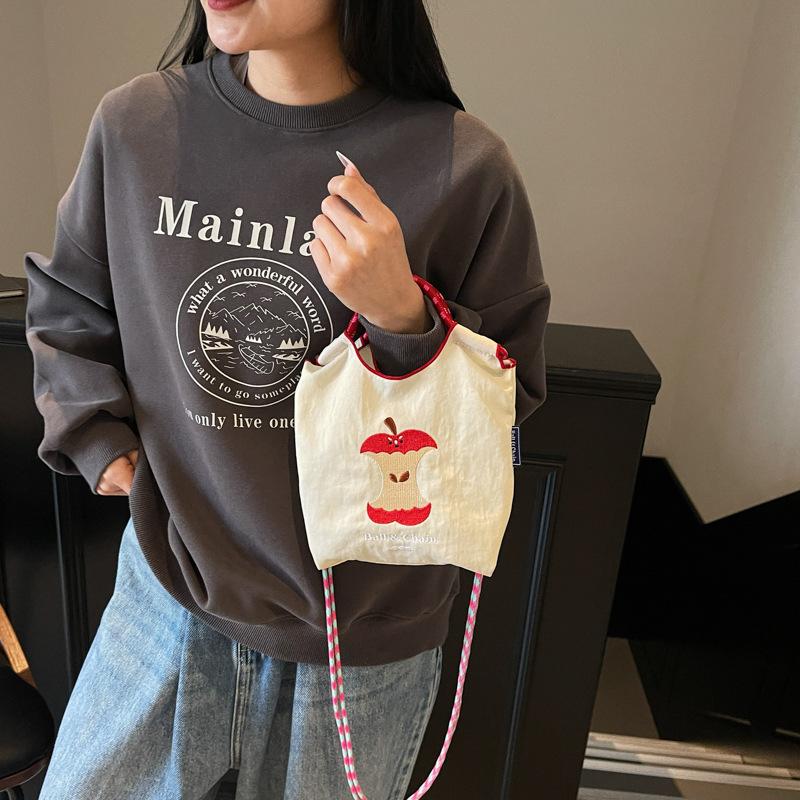Japanese embroidery cute apple bucket bag girl 2025 new mobile phone bag versatile commuter shoulder messenger bag