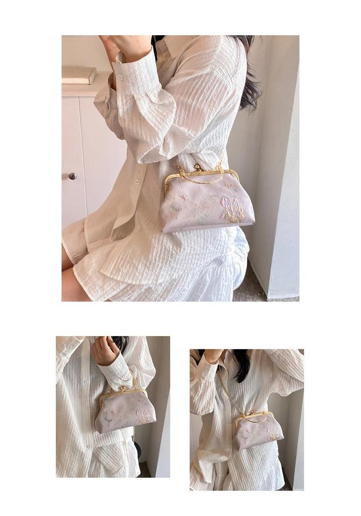 Elegante bestickte Umhängetasche mit Kettenverschluss