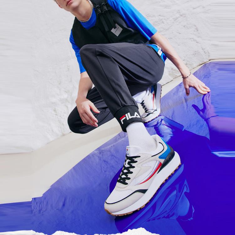 FILA Knitted Breathable Cuffed Sports Pants Men Bottoms Legendary-Blue F51M138619FNV