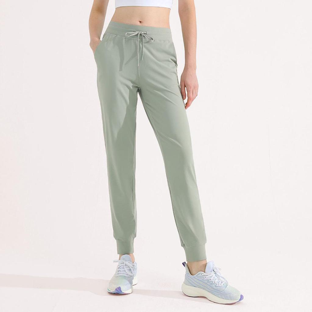 Women's Green Drawstring Quick-Dry Sports Pants: Lightweight, High-End, Straight-Leg Design for Summer.