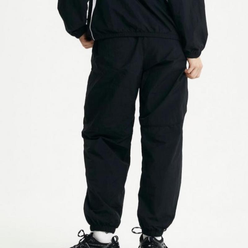 New Balance Pantaloni Jogger Uni Runners Nbnte22423