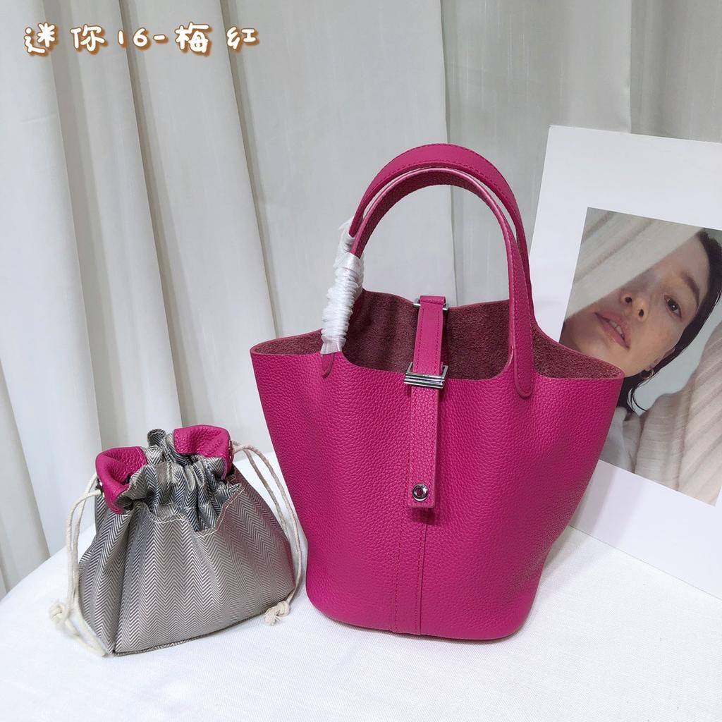 Spot wholesale top layer cowhide vegetable basket bag leather bucket bag commuter fashion lock buckle hand-held handbag woman