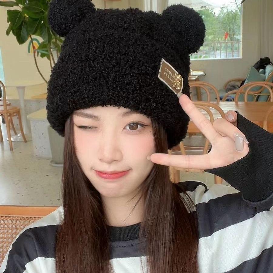 Autumn and winter thickened soft waxy warm cold ear protection cold hat Korean version of metal cute bear plush knitted versatile model