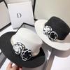 French Paris Fashion Show Small Fragrant Flower Flat Top Top Hat Summer Light Luxury Grass Woven Sunscreen Sun Hat Women