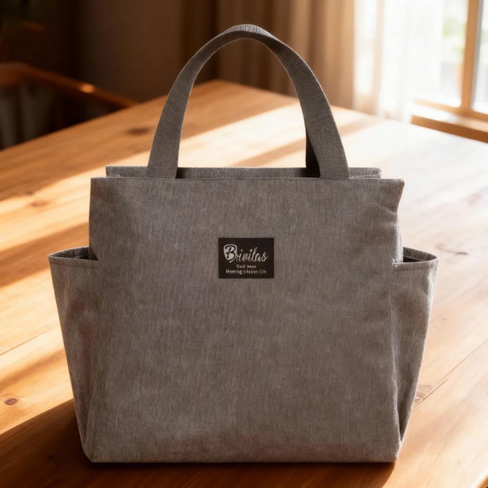 

Large-capacity insulated lunch bag, unisex, keeps food hot or cold, perfect for work, school, or picnics.xtz серый