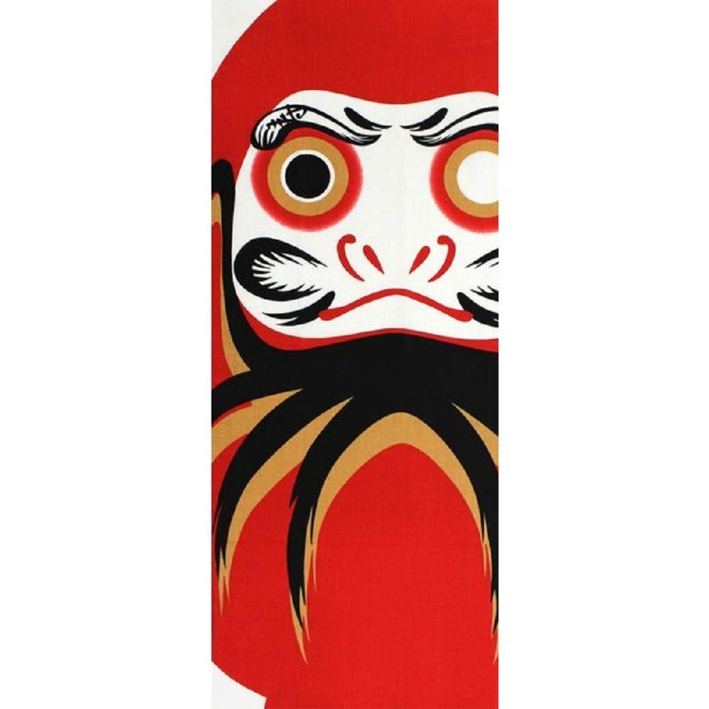 Japanese hand towel with traditional Japanese featuring a red Daruma Made in pattern, doll. Japan.