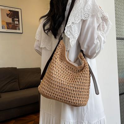 Gewebte Tasche Damen 2025 neue Sommer-Schultertasche große Kapazität Eimertasche Strandurlaub Strohtasche