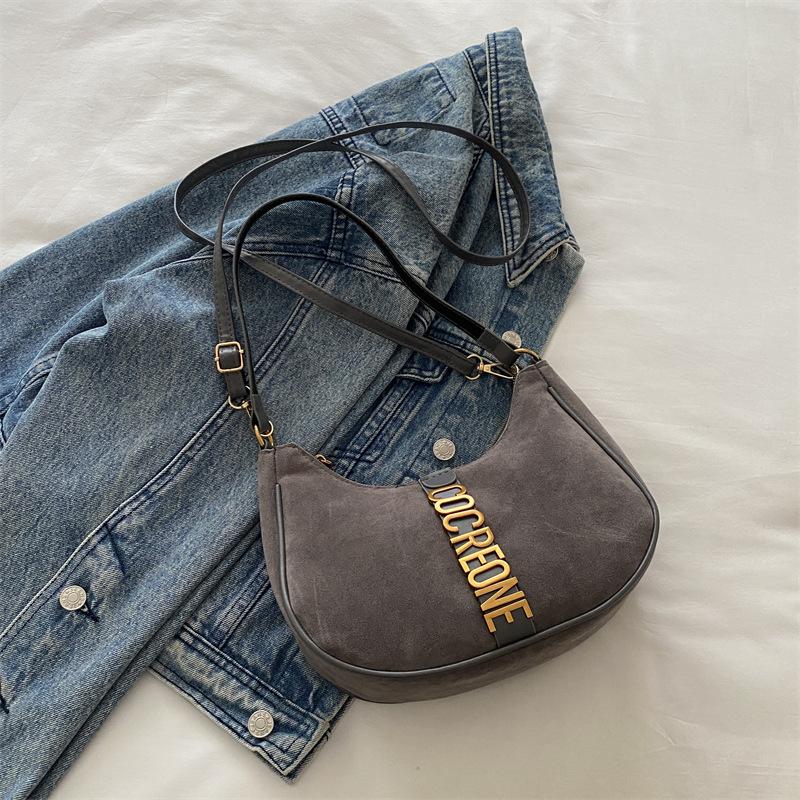 

Маленькая свежая сумка подмышку 2025 осень новая простая текстура сумка-пельмень нишевая высокая ценность ретро плечевая сумка-полумесяц серый