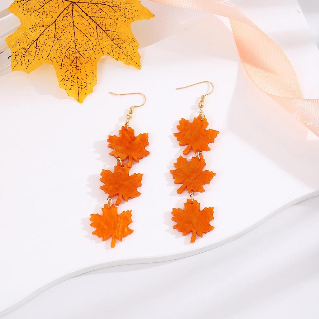 Elegant Maple Leaf Tassel Earrings - Red Acrylic Dangles for a Face-Slimming Effect