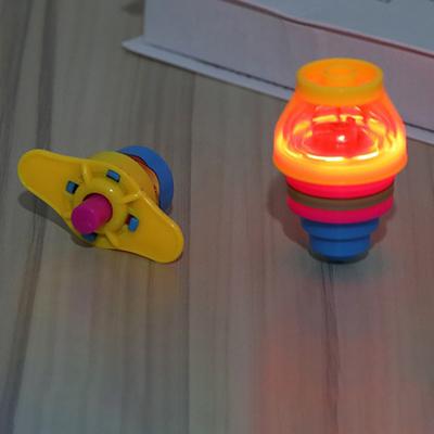 Kinder Flash leuchtende Kreisel Spielzeug Gyro Katapult Gürtel Launcher LED-Licht