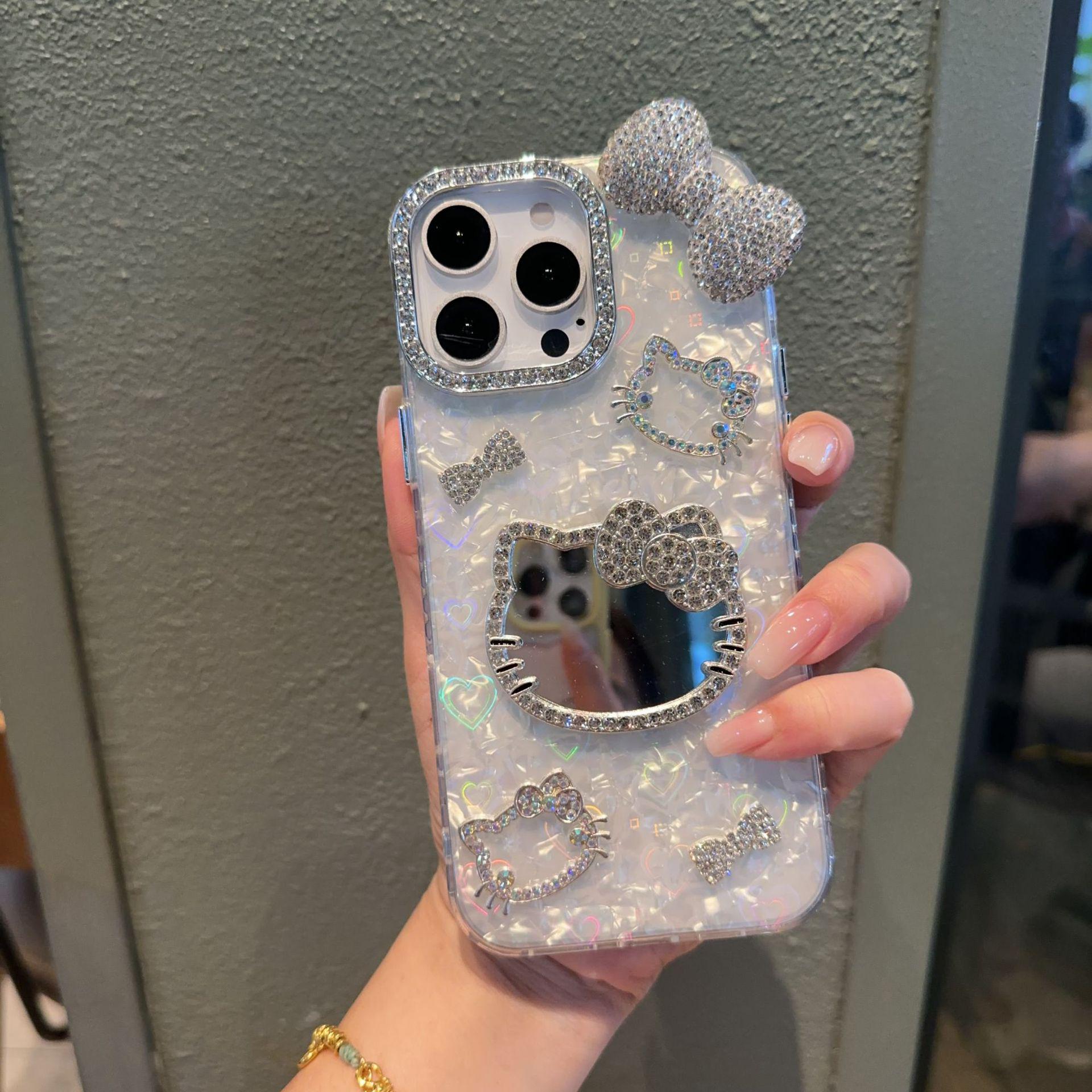 

Heart-Shaped Shell Pattern Kiki Cat Mirror Case for iPhone 17 Pro Max, 15, & 14 iPhone 14 Plus