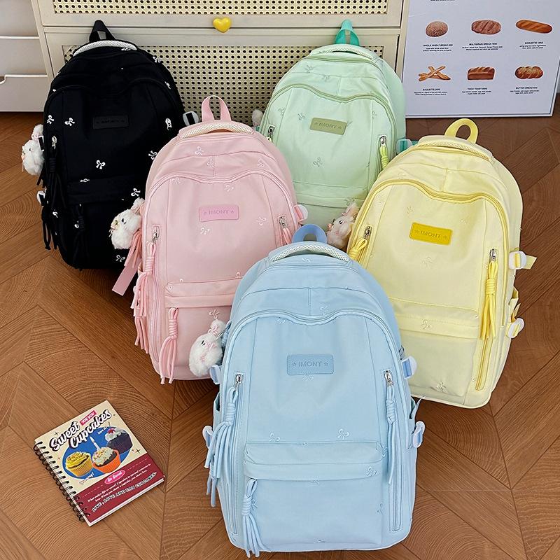 Schoolbag hot sale high value new Japanese ins fresh sweet candy color butterfly backpack junior high school students light shoulders