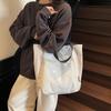 Japanese niche design casual shoulder cloth bag 2025 spring trend foreign style personality large capacity commuter tote bag