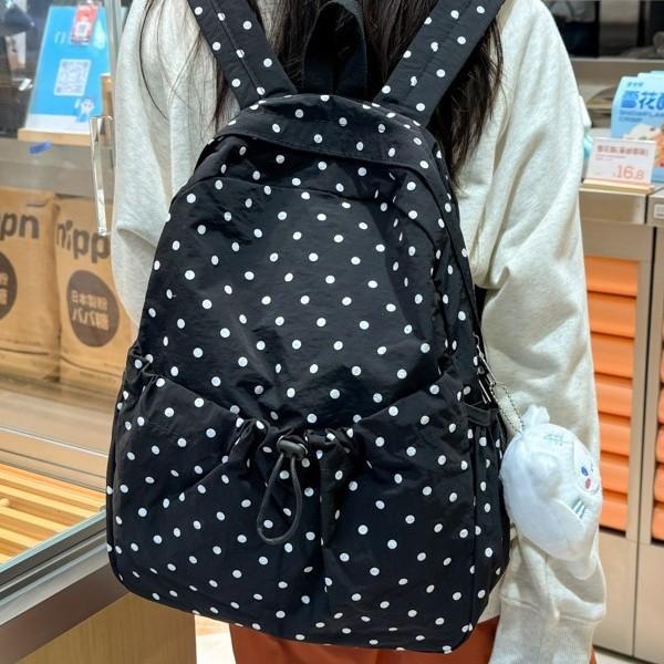 Schoolbag1011 Korean version of the new large-capacity school commuter backpack female Korean version of the niche polka dot flash design backpack