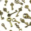 100-delars vintage nyckelhängen - olika antika bronsmetallhängen, utsökt designade, lämpliga för gör-det-själv-smyckestillverkning och bröllopsfestpresenter