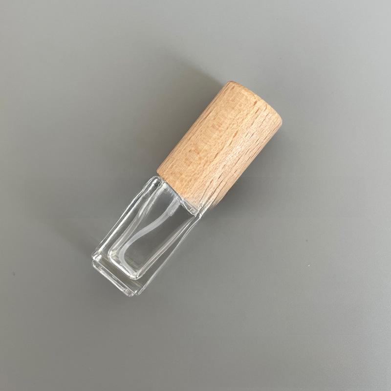 

Портативный стеклянный флакон для духов с деревянной крышкой, варианты 5 мл и 10 мл 3ml