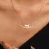 Women's Versatile Cross Cat Necklace: Cool-Style Stainless Steel Chain with Light Luxury Design.