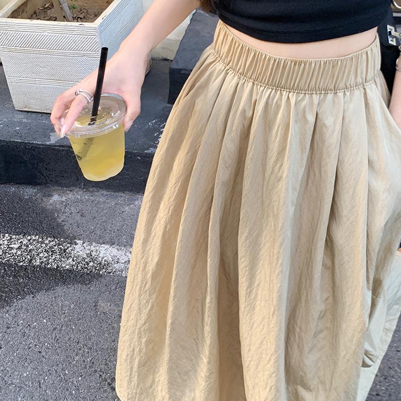 Neuester französischer kniehoher schmaler mittellanger Vintage-Stil A-Linien-großer Schirmrock für Damen im Sommer