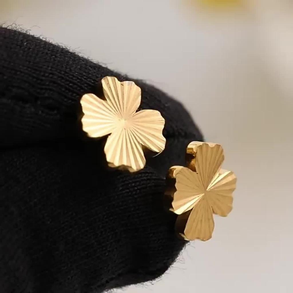 A Pair of Lucky Clover Earrings, Lightweight and Durable Design, Versatile Earrings for Daily Wear, Symbolizing Exquisite Earrings and Luck.