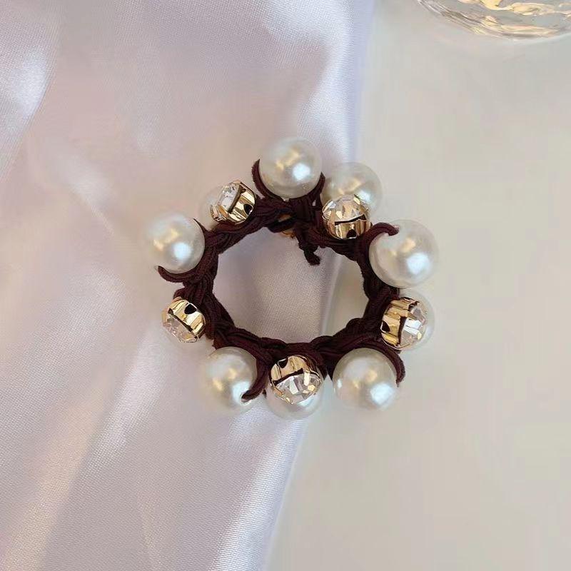 "Versatile Pearl Hairband: High-Elastic Luxury for Stylish Buns and Ponytails"