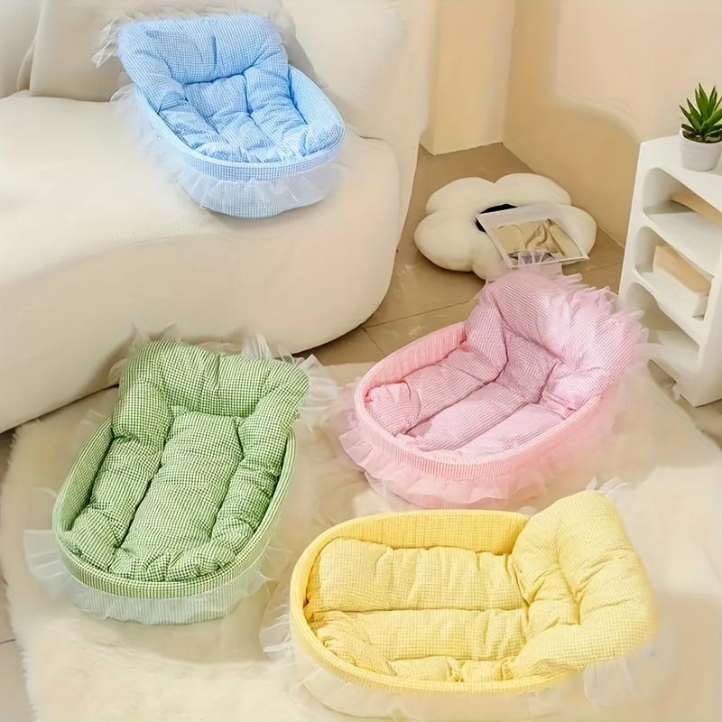 Four-season cat sofa bed with ruffle design, soft and anti-hairball. Fits cats and small dogs, multiple colors available.