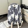 The new schoolbag is high-value, fresh and sweet, literary tie-dye backpack, couple contrasting colors, light travel backpack.