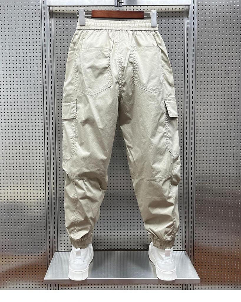 Men's Tapered Quick-Dry Elastic Cargo Pants with Drawstring, Multi-Pocket, Casual Trendy 9-Point Style for Spring and Autumn.